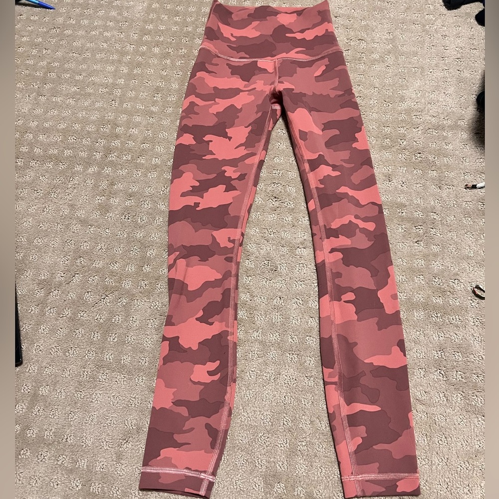Lululemon size 2 women’s pink camo leggings.